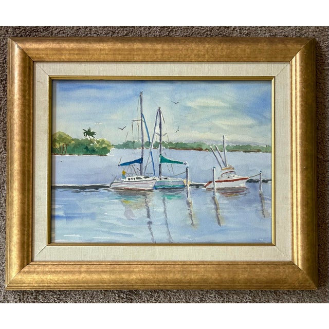 Original impressionist watercolor painting ting of sailboats at a dock. In gold frame with linen liner.