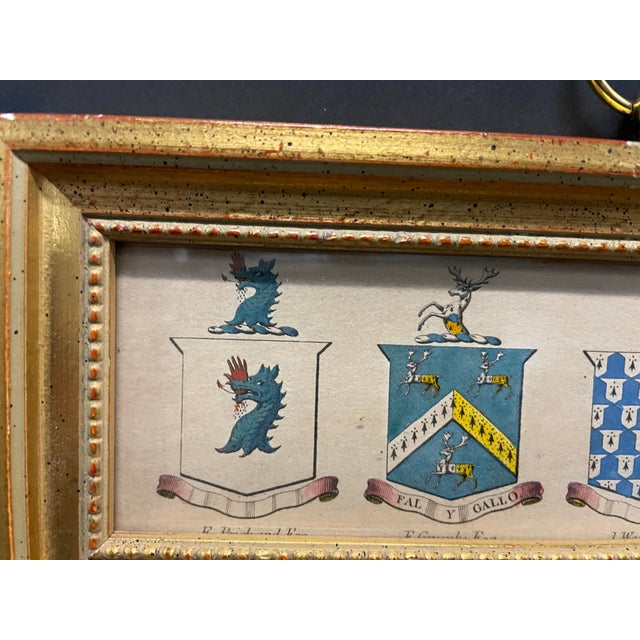 Antique engraving of coats of arms in a 1990s frame. Overall size is 3.5 x 9.5 not including hanger. Combined shipping...