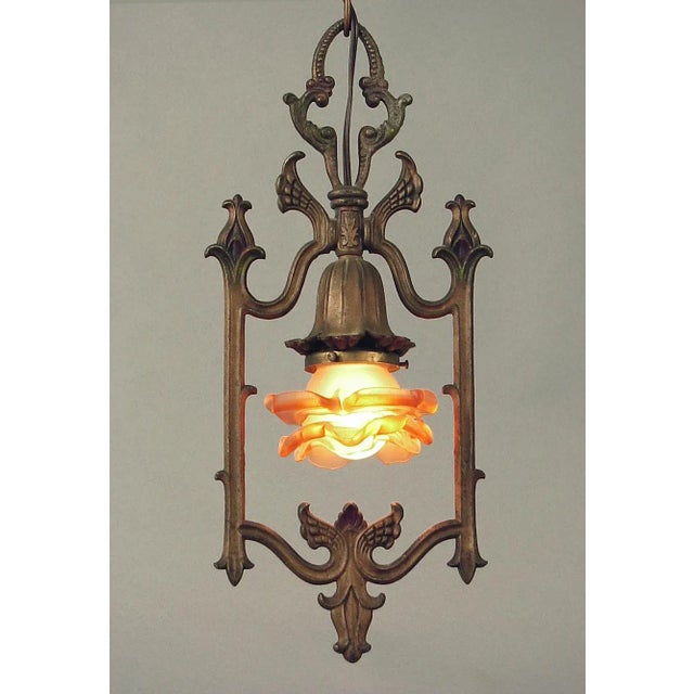 This visually arresting light fixture will dazzle everyone who sees it! The main apparatus is American, from the 20s -- so...