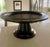 Mid 20th Century 21" Ebonized solid wood pedestal tray. The stand has a minimalist, modern aesthetic often used to elevate...