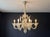 A mid century modern Italian six light chandelier made of hand blown Murano Venetian opal glass. Made in Italy. Circa...