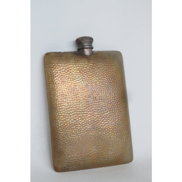 This gorgeous metal flask features a vintage hammered design and a screw on metal cap. This vintage styled flask is the...