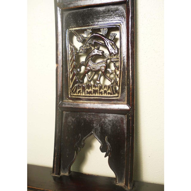 This style of chair is known as the "official's hat chair" because the projections over the rear stiles resemble the knobs...