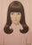This art print, measuring 9x12 inches, titled "Serene Portrait with Pastel Pink Tones," portrays a tranquil female figure,...