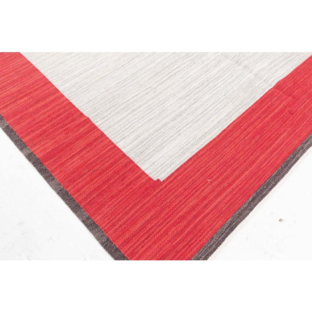 Vintage Swedish Flat Woven Rug by Ingrid Dessau Size: 7'0" × 10'10" (213 × 330 cm) This striking vintage Swedish flat-...
