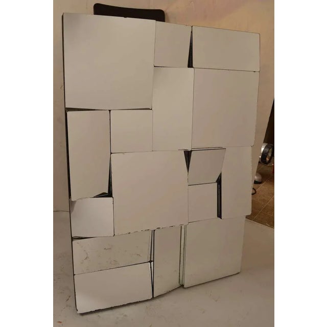 Slopes, Cubist multi plane surface wall mirror. Clear mirrored surfaces mounted in black paint wood frame.