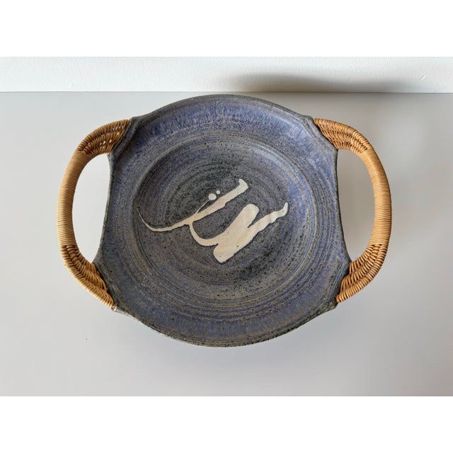 Beautifully crafted in the 1980s, this Jensen Art Studio pottery plate/bowl showcases the timeless character of hand-...
