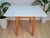 A charming and highly practical vintage Formica kitchen table dating from the 1960s, featuring a delightful light blue...