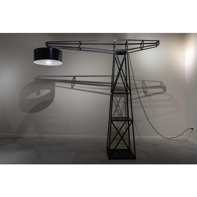 Large floor lamp made of iron in the shape of a construction crane. It disassembles into two large, easy-to-assemble...