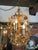 Vintage 1960s Italian Mid Century Hollywood Regency Gilt Floral and Fauna Six Light Chandelier. Beautiful styling and...