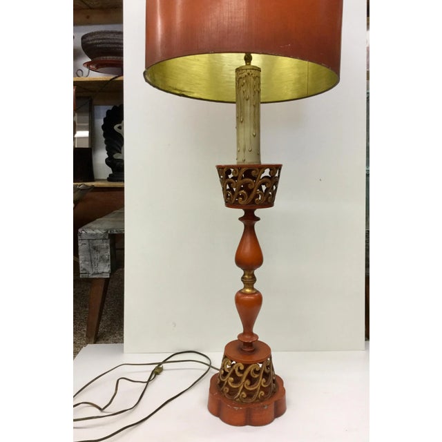 This super tall deep coral and gilded gold lamp can be used on a table, desk, or even on the floor. A giant 48” tall with...