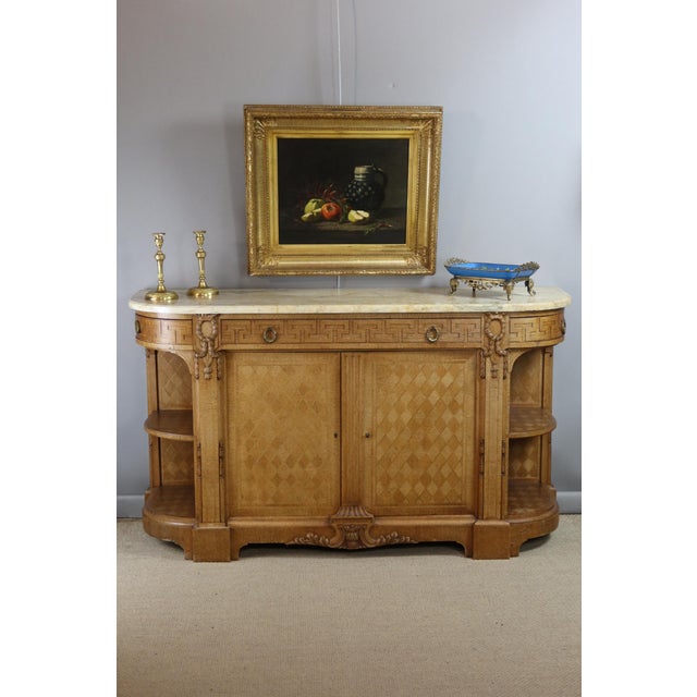 Rare complete dining room in bleached oak including a sideboard (1.80m x 0.56m and 1.03m high) a table (1.59m x 1.29m and...