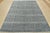 This fine contemporary area rug is hand-knotted with an all-wool pile on a cotton foundation. This rug is new and in...