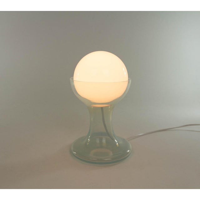 LT 215 table lamp designed by Carlo Nason and manufactured in the 1960s by Murano glassmaker A.V. Mazzega. The lamp is...