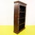 Brown Carved Wooden Bookcase with Floral Motifs and Stylized Figures For Sale - Image 8 of 10