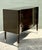 This sophisticated Vanguard Furniture commode seamlessly blends Art Deco-inspired glamour with contemporary refinement....