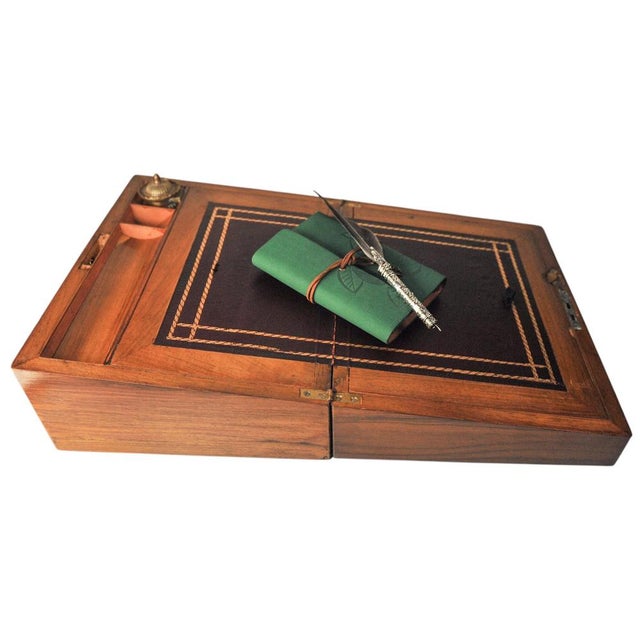 Victorian military campaign burr walnut writing slope with a tooled black leather skiver slope will include a single glass...