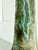 Elegant, hand-thrown ceramic candlestick from the 1970s with an unknown signature. The slender, slightly conical form is...