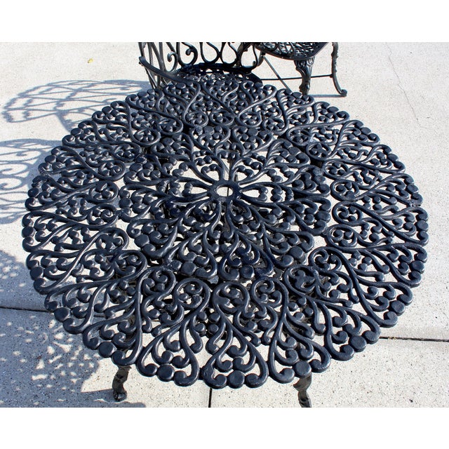 Mid-Century Ornate Cast Aluminum Patio Dining Set – Filigree Round Table With 4 Heart-Back Armchairs For Sale - Image 13 of 16