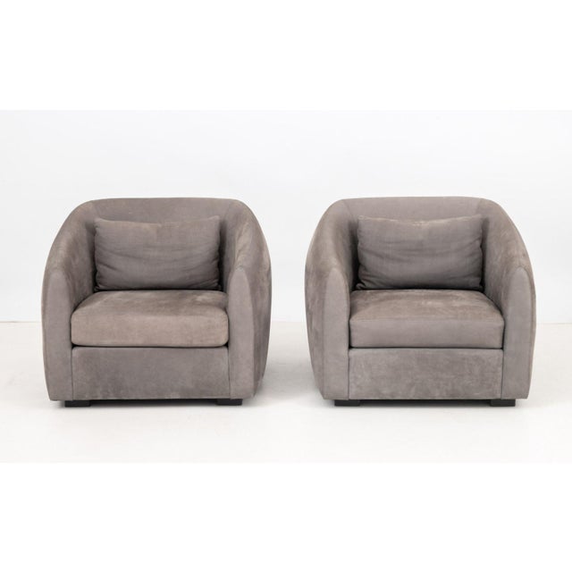 Pair of Modern Style Gray Suede Tub Chairs, with one lumbar cushion. 30" H x 31.5" W x 35" D; seat: 16.5" D. Provenance:...