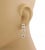 This is an adorable authentic pair of earrings from designer Tous, crafted from 18k yellow gold featuring mother of pearl...