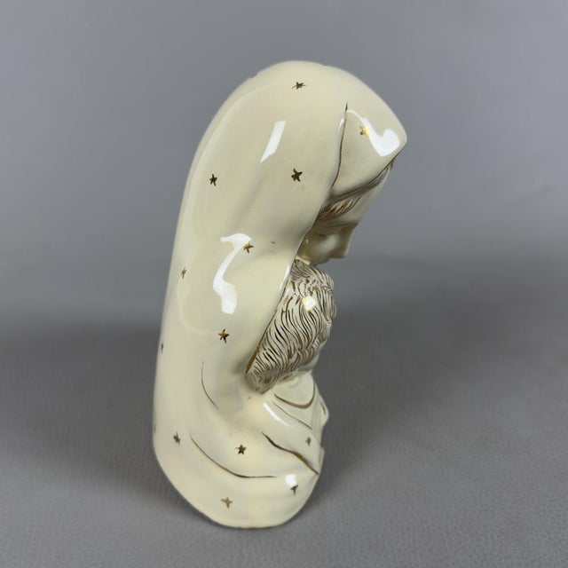 A devotional icon of extraordinary sweetness and elegance. This rare and valuable sculpture represents a magnificent...