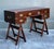 This distinguished vintage campaign desk by the esteemed maker Jans of London is a masterclass in classic British...