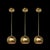 This set of three exquisite Mid-Century Modernist brass pendant chandeliers epitomizes the elegant design sensibility of...