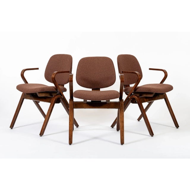 This set of three vintage mid century modern bent plywood armchairs designed by Joe Atkinson for Thonet are circa 1950....