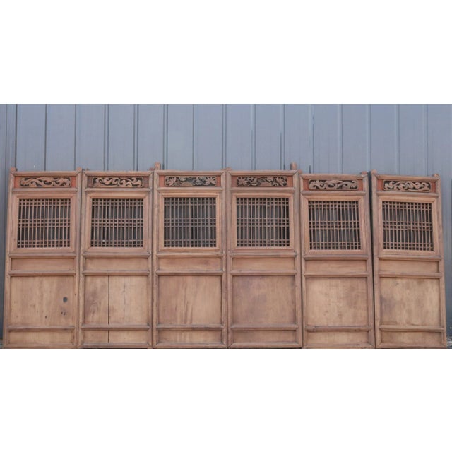 With its open lattice pattern, beautifully carved top, and warm wood texture, this 6 panel screens can be excellent widow...