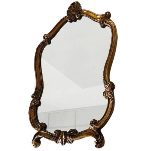 Baroque mid-century XL crested mirror with a classic gold leaf gilded frame with ornate decor made of solid wood from the...
