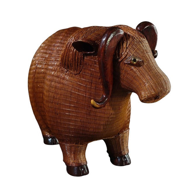 A beautiful and charming lacquered water buffalo figure from the Shanghai Collection. Carved wooden horns crown expressive...
