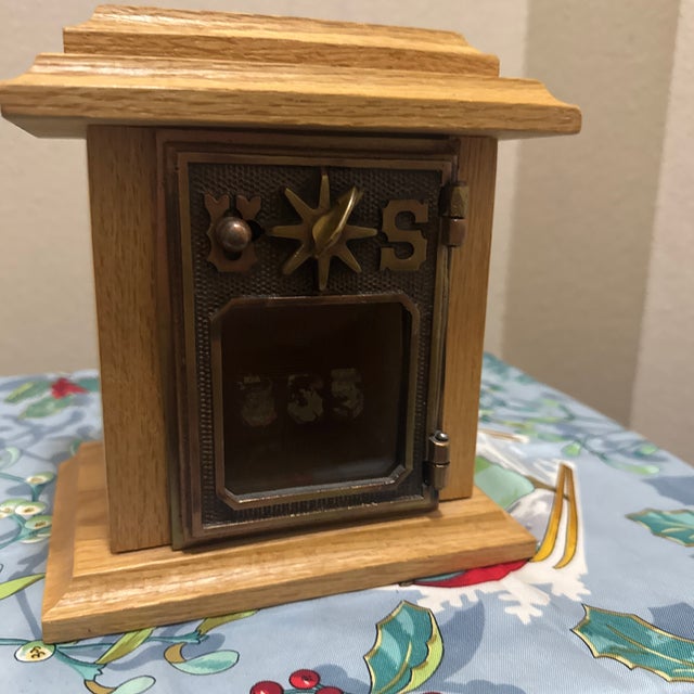 Add a touch of historical charm to your collection with this handcrafted Post Office Door Coin Bank. The front features an...
