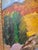 Idyllic American fall landscape featuring vibrant greens, reds, and golden yellows. It is a beautifully abstracted scene...