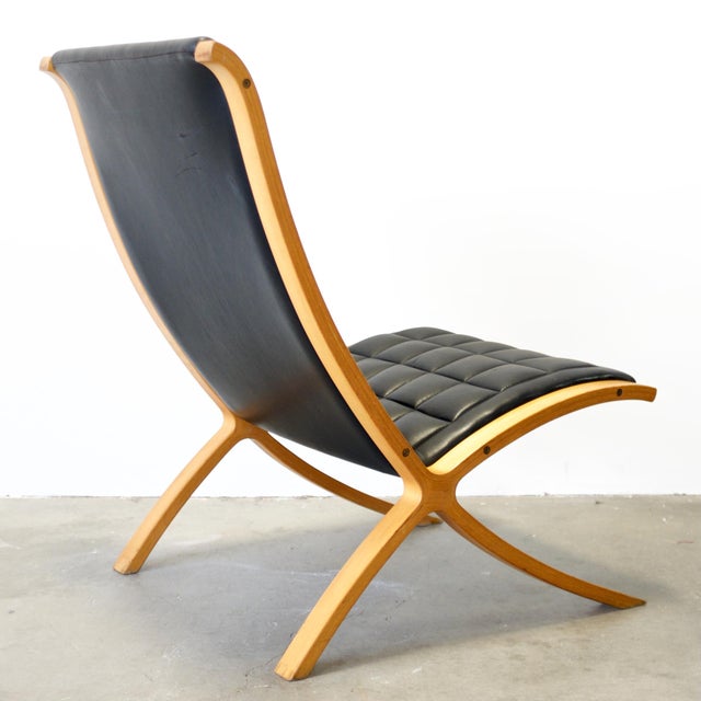 Dimensions: 26 3/4” L x 33” D x 36” H / Seat Height 16” Origin: Allerød, Denmark Designer: Peter Hvidt & Orla Mølgaard...