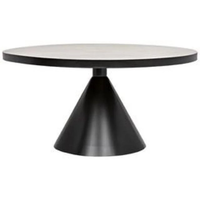 A masterpiece of minimalism, the Cone dining table by Noir has been expertly handcrafted of simply finished metal. The...