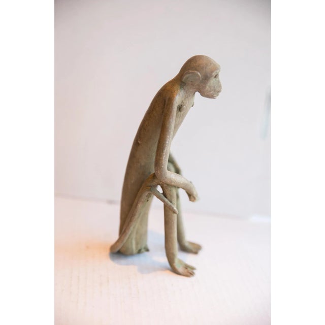 Metal Vintage African Sitting Monkey With Banana Sculpture For Sale - Image 7 of 8