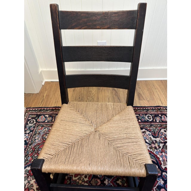 GUSTAV STICKLEY OAK ROCKING CHAIR NO. 305, Stickley's red Craftsman Workshops shopmark, c. 1904-1906, having three...