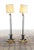 Mid-century modern pair of designer bronze floor lamps-circa 1950s in excellent condition.