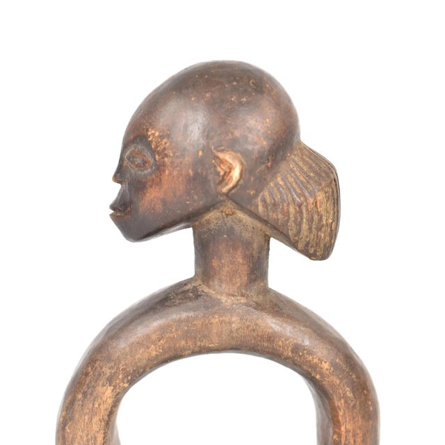 The Songye Katatora Divination Oracle from Congo is a powerful symbol of spiritual guidance and cultural tradition within...