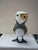 A charming, one-of-a-kind handmade paper mâché owl figurine featuring a bold folk-art aesthetic. The piece showcases a...