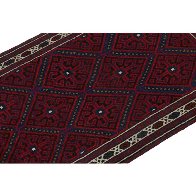 Hand knotted in wool, this 6x8 Baluch rug represents a new line of tribal carpets in the Modern Classics Collection by Rug...
