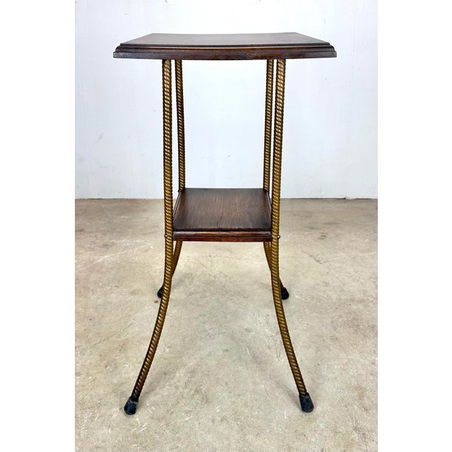 A cool Arts & Crafts meet Victorian antique plant stand in oak with unusual twisted gilt metal legs. Shows nice age and...
