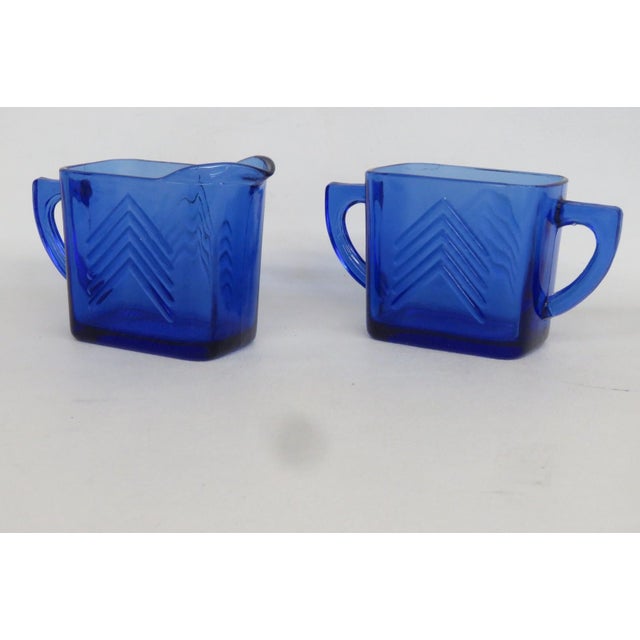 This beautiful Creamer and Sugar bowl set is made of glass. This lovely pair of serving dishes present a stylish Chevron...