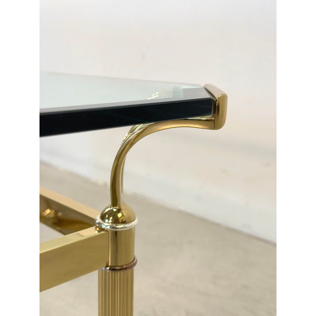 1980s coffee table, gold-plated brass frame and beveled glass top