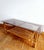 Large rectangular coffee table, vintage design circa 1960. Rattan frame with stretcher and large rectangular smoked glass...
