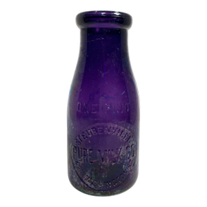 C. 1900–1915 Steubenville Pure Milk Co One Pint Bottle Amethyst Irradiated Glass