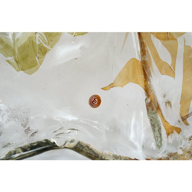 A Murano glass centrepiece featuring delicate shades of amber and gold, dating from the second half of the 20th century....