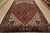 An authentic vintage traditional tribal Heriz rug hand-knotted with fine wool and natural dyes. This oriental rug features...