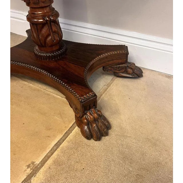 Wonderful antique Regency quality rosewood card table, having a quality rosewood fold over top with a carved edge opening...